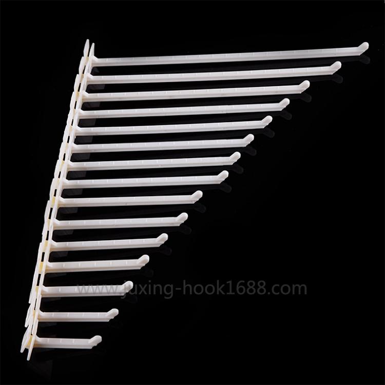 Manufacturers wholesale paper shelf hooks, toothed long hooks, paper pile head card slot board plastic hooks